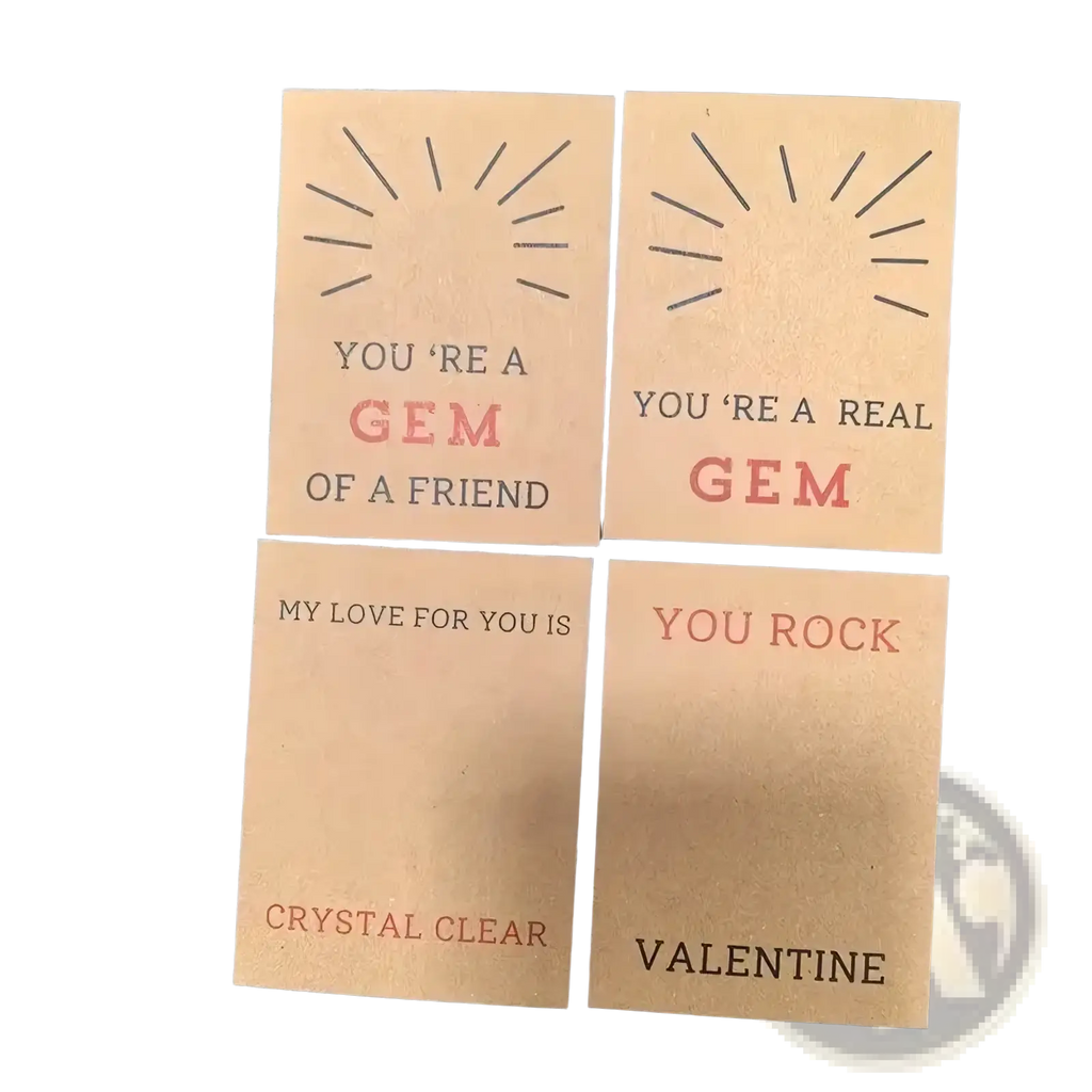 Four square kraft paper gemstone heart valentine cards with embossed sunburst designs and printed messages