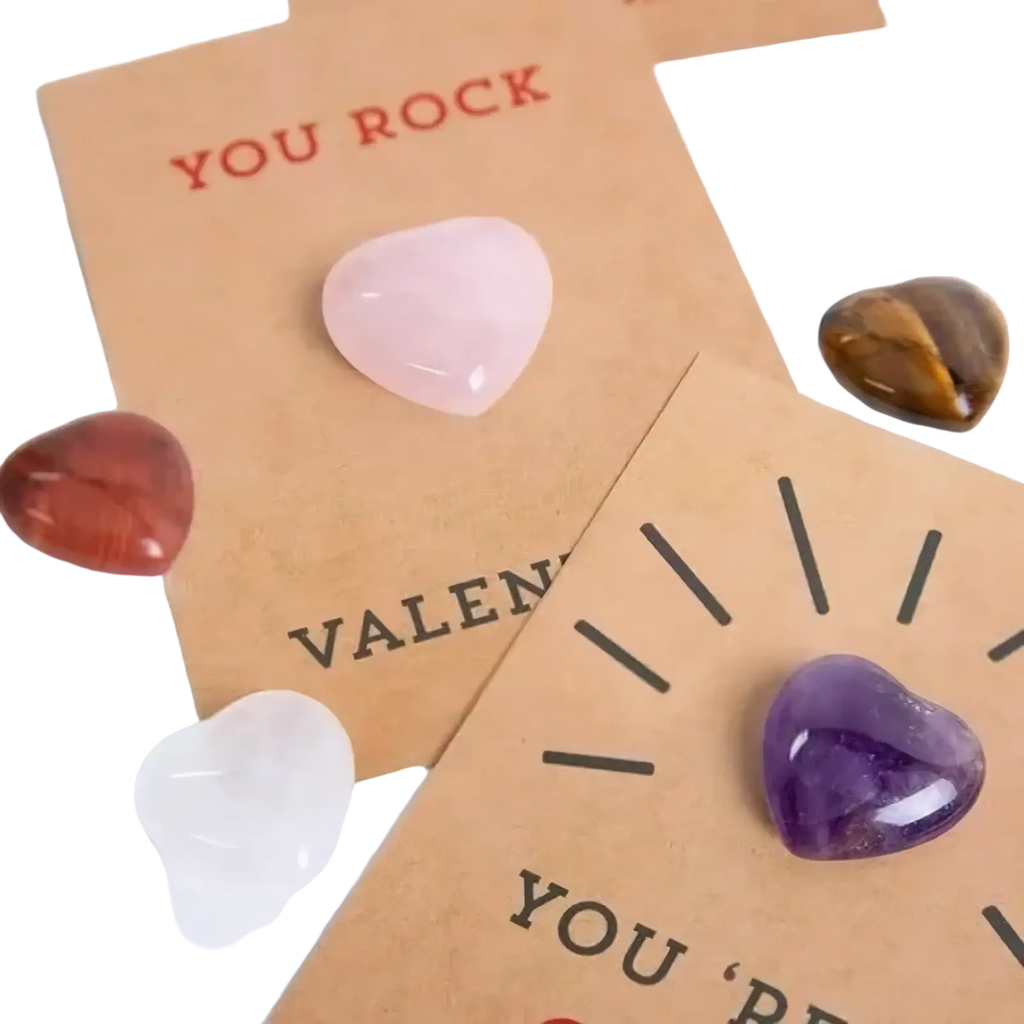 A translucent pink heart-shaped crystal stone on a brown card reading you rock from gemstone heart valentine cards 24 pack