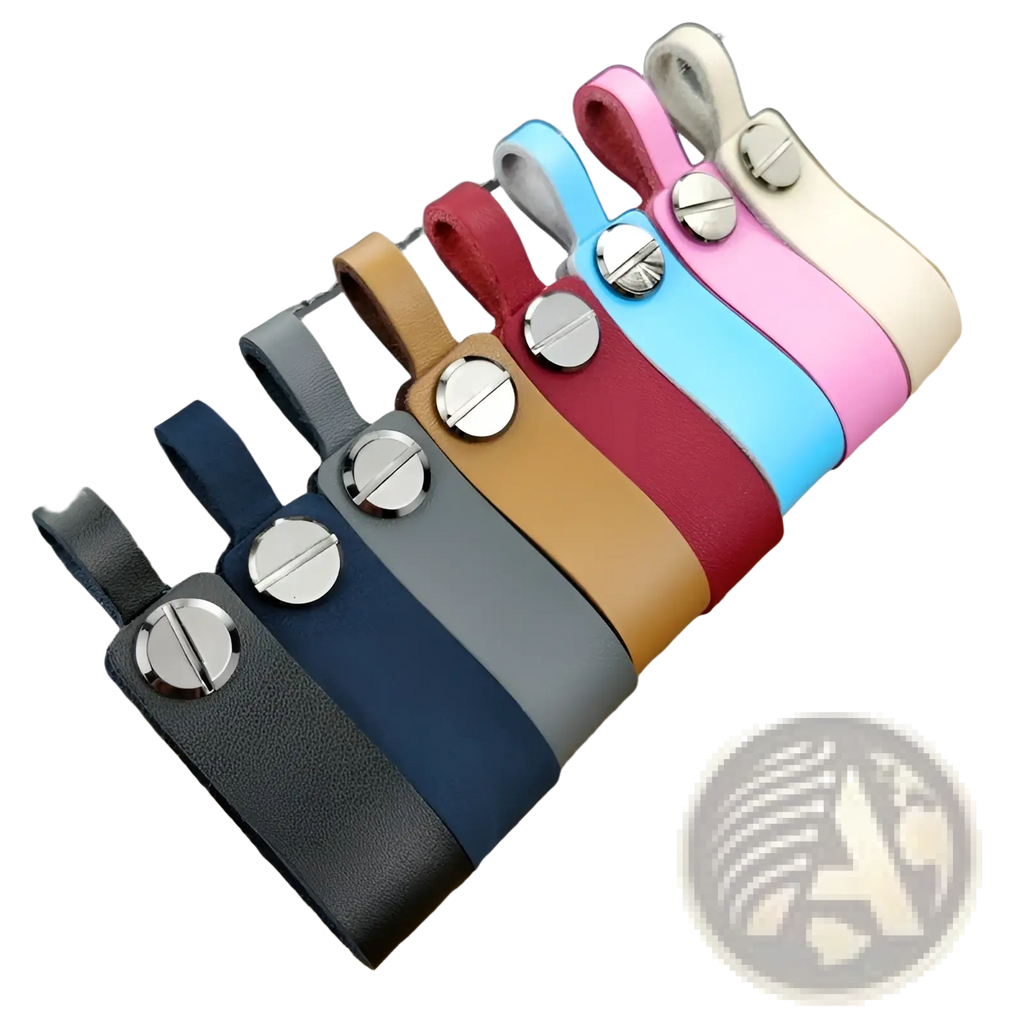 A collection of colorful genuine leather car keychains with silver-toned screw caps and metal key rings
