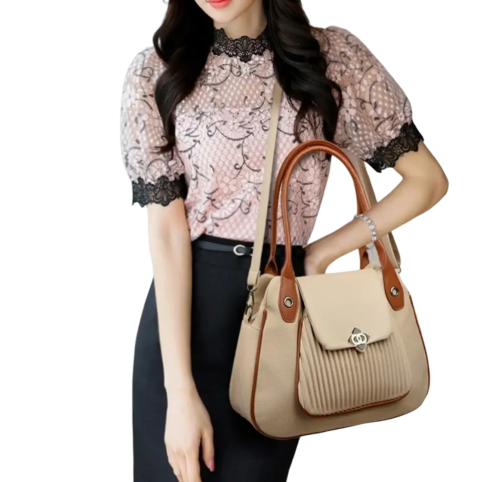 Beige genuine leather casual tote with brown leather trim, silver-tone logo clasp, and front flap pocket interior closure