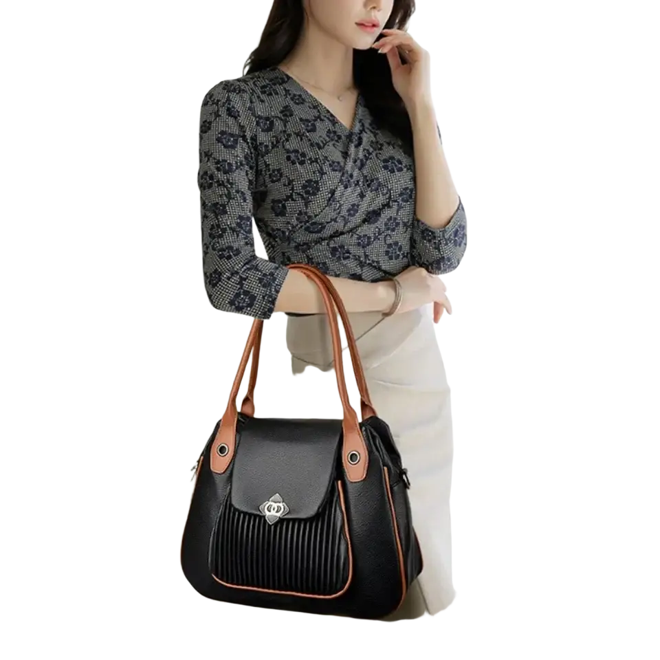 Black genuine leather casual tote with brown accents and pleated front panel featuring a pocket interior