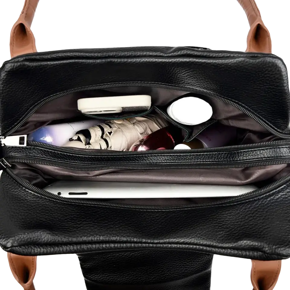 Black genuine leather casual tote shoulder bag with textured surface and brown handles featuring pocket interior