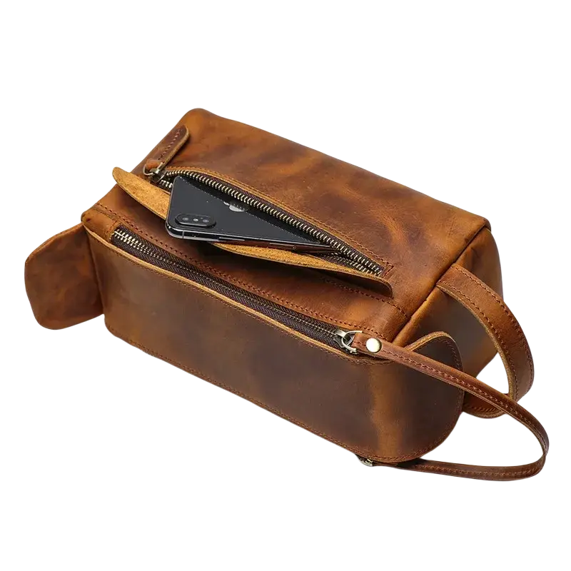 Genuine leather brown grooming clutch bag size 26x15x11cm with multiple zippers pocket interior and detachable strap