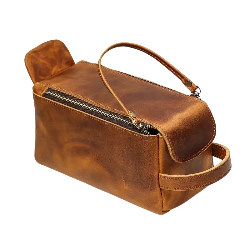 A tan genuine leather clutch bag size 26x15x11cm with zipper closure top handle side strap and pocket interior