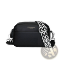Black textured genuine leather crossbody bag with a contrasting black and white geometric pattern strap