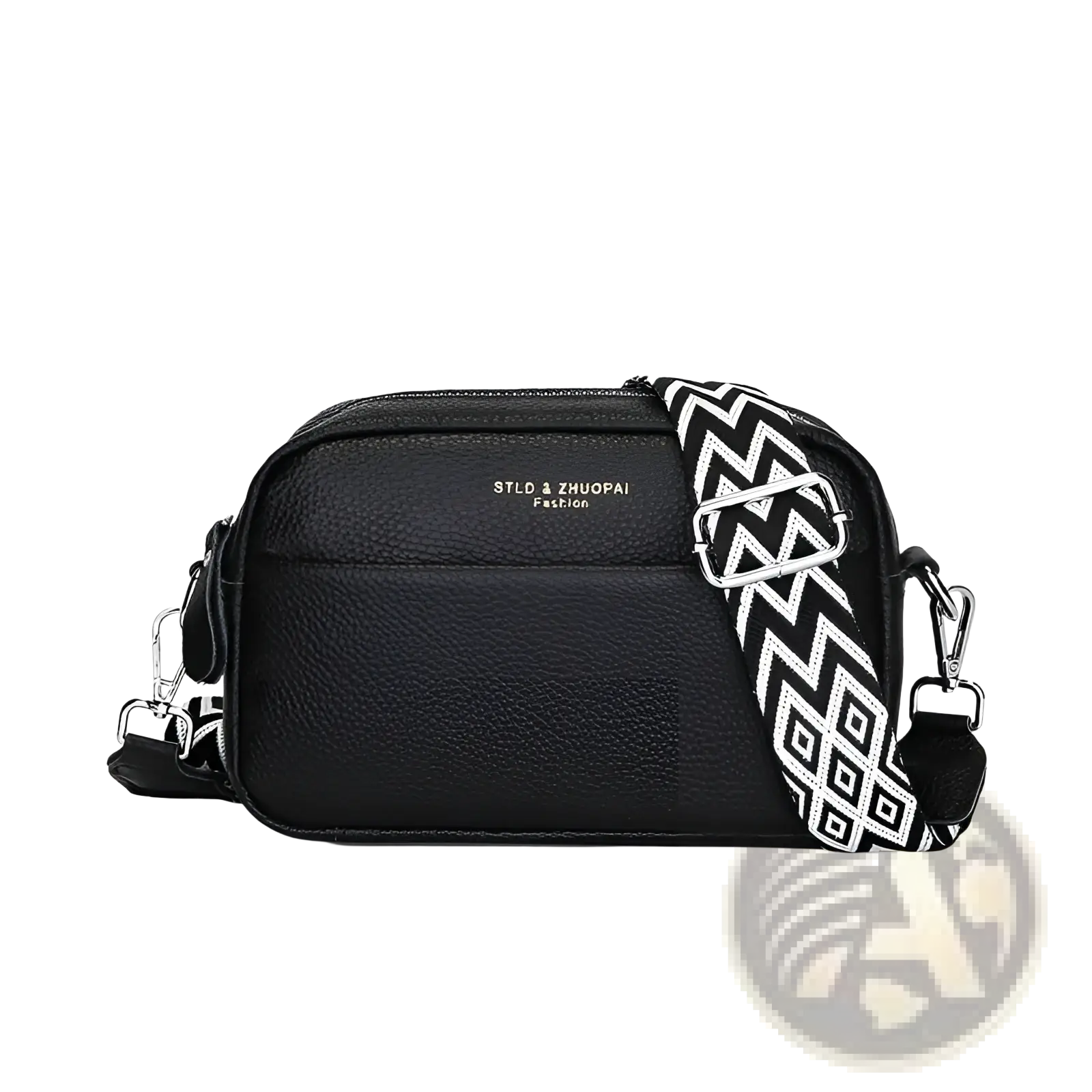 Black textured genuine leather crossbody bag with a contrasting black and white geometric pattern strap