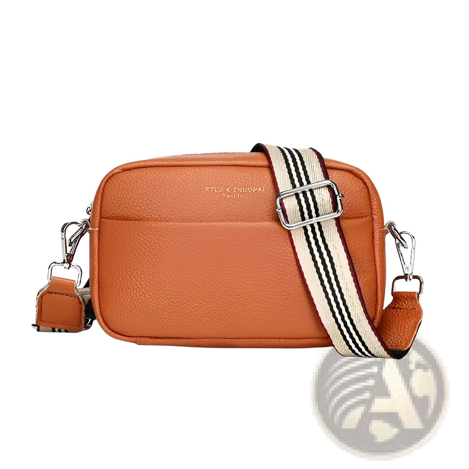 Genuine leather orange textured crossbody bag with striped geometric pattern fabric strap and silver hardware