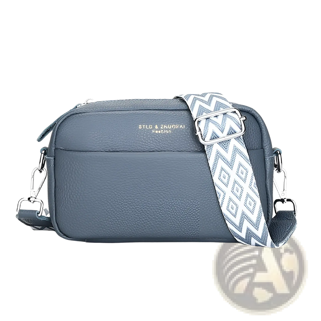 Genuine leather crossbody bag in gray textured leather with a geometric patterned strap for stylish carry