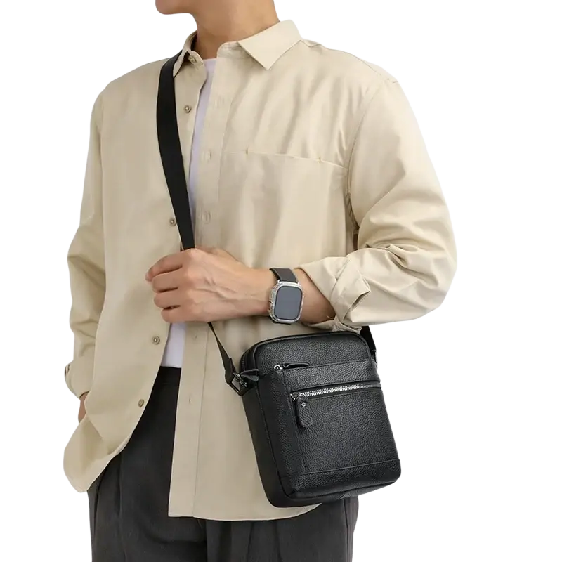 Black genuine leather crossbody bag for men with textured finish sleek minimalist design and adjustable strap for business casual