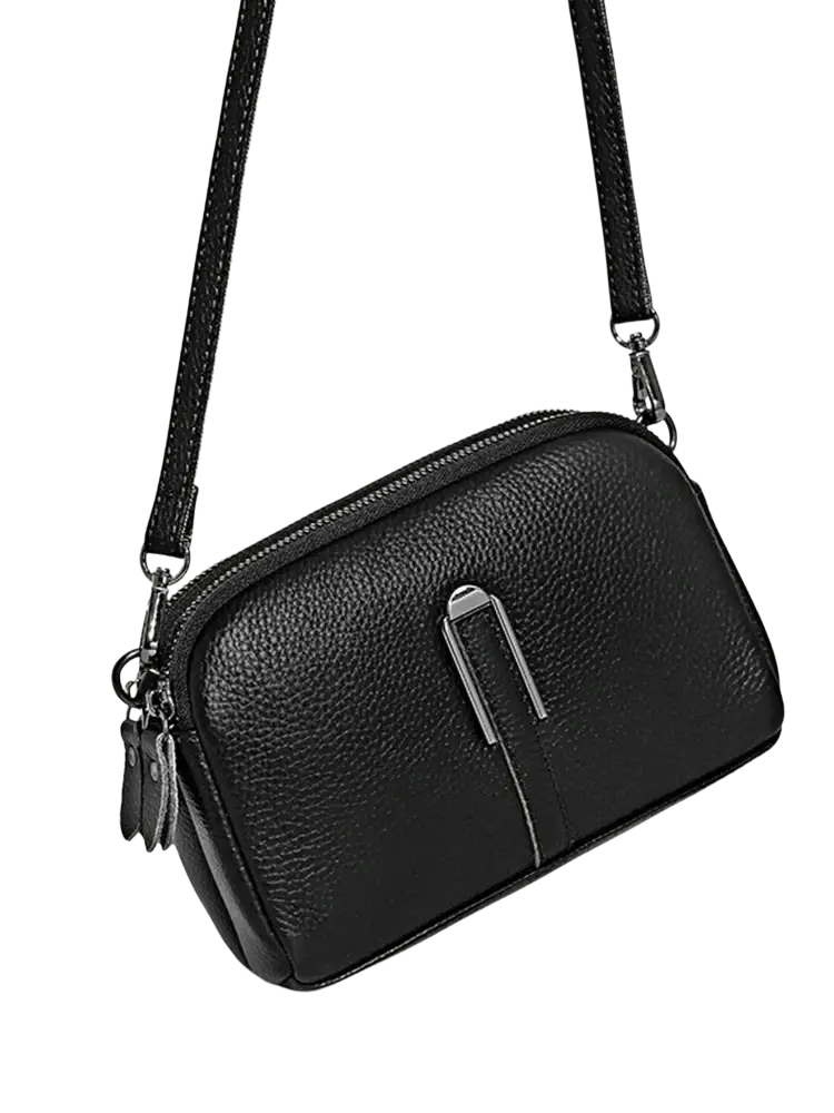 Genuine leather crossbody bag for women in black pebbled leather with silver-toned clasp and adjustable strap