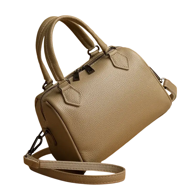Beige genuine leather crossbody bag with textured satchel design, top handles, and detachable shoulder strap for women