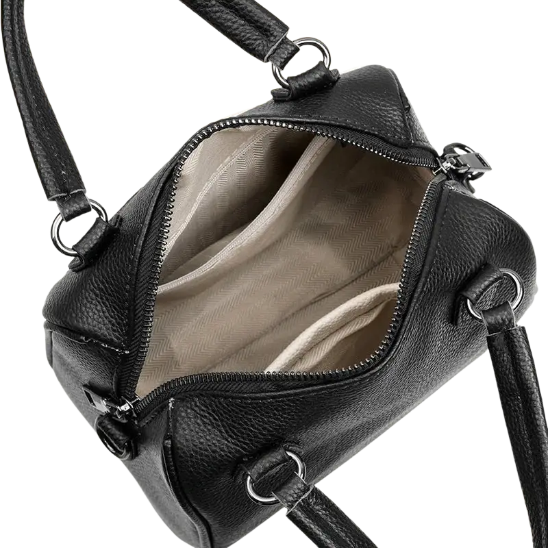 Black genuine leather crossbody bag with beige interior and silver-toned hardware for luxury women tote use