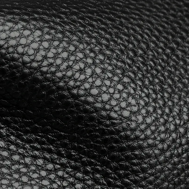 Black textured genuine leather crossbody bag for women with a pebbled surface luxury tote design
