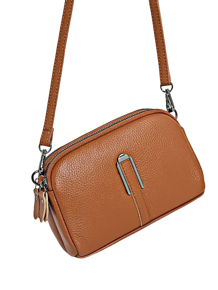 Tan genuine leather crossbody bag for women with textured surface and silver-toned metal clasp