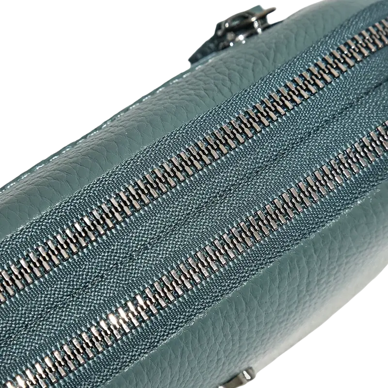 Teal genuine leather crossbody bag for women with pebbled texture and dual silver zippers clutch design