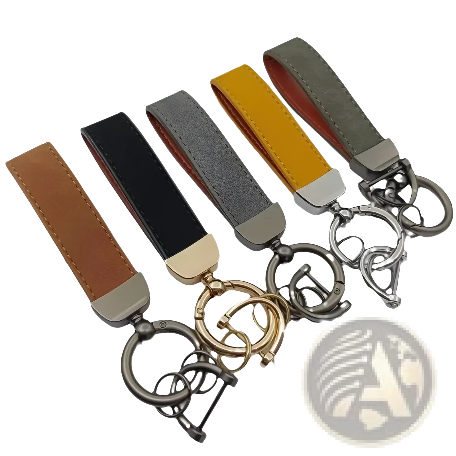 A set of five genuine leather keychains in brown black gray mustard yellow and olive green with metallic hardware