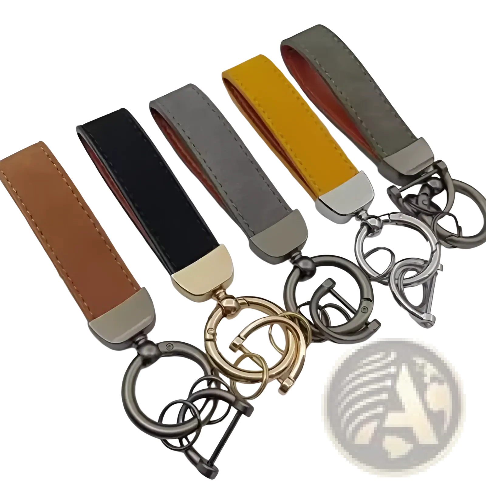 A set of five genuine leather keychains in tan black gray yellow and olive green with metallic hardware for car keys
