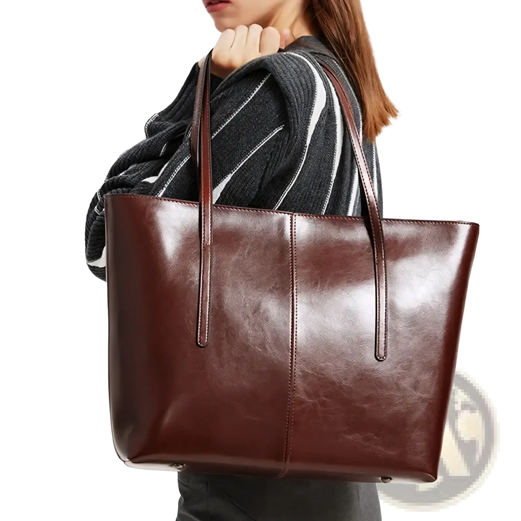 A sleek rich brown genuine leather laptop tote bag for women with structured sides and matching handles