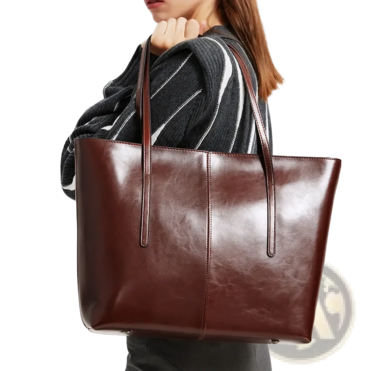 A sleek rich brown genuine leather laptop tote bag for women with structured sides and matching handles