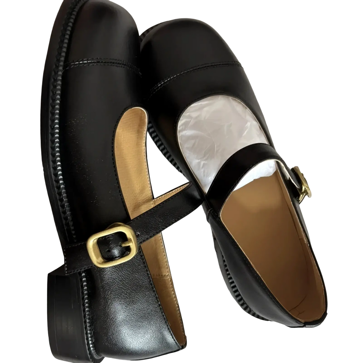 Genuine leather mary jane flats in black with a gold-toned buckle and stitched detailing large size shoes