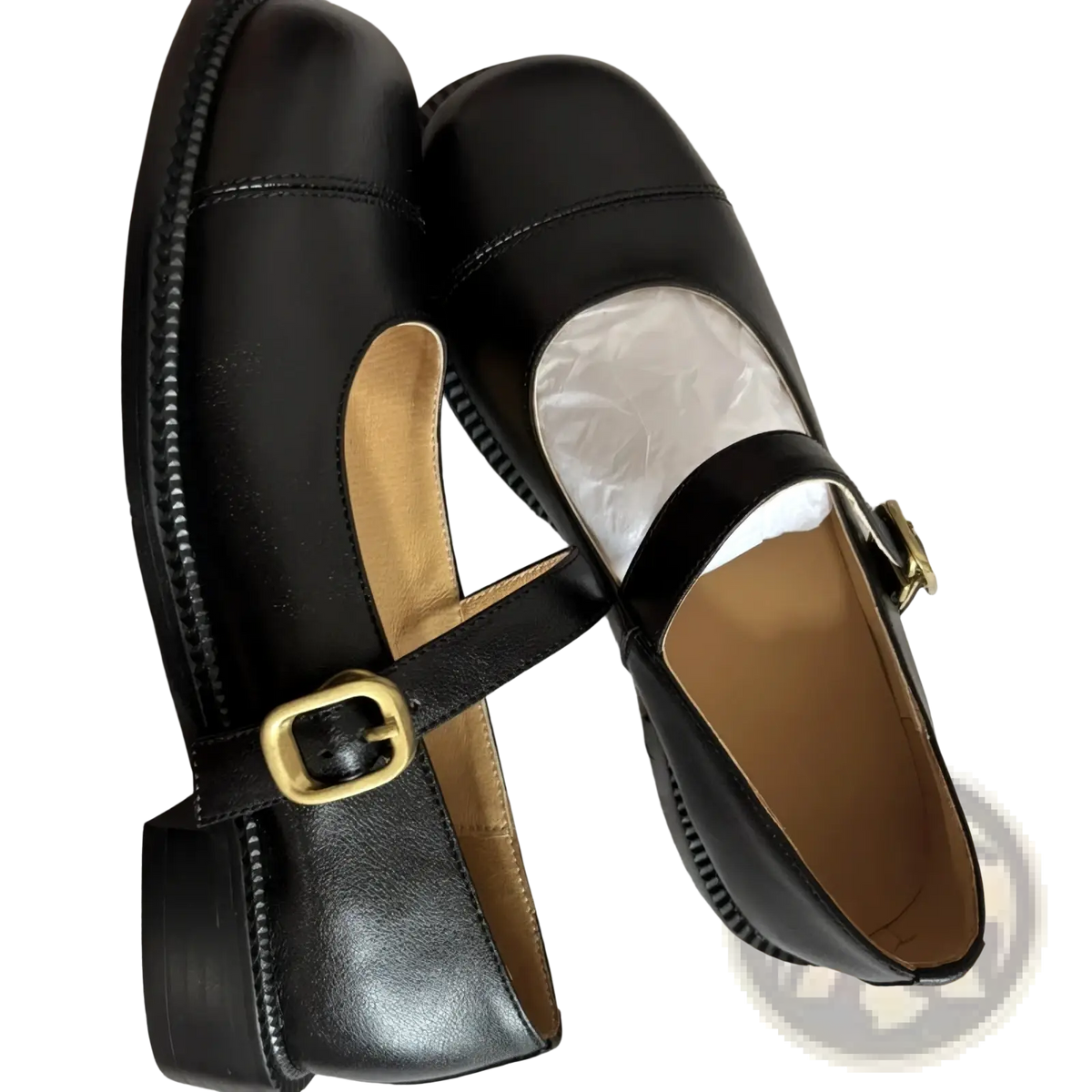 Genuine leather mary jane flats in black with a gold-toned buckle and stitched detailing large size shoes