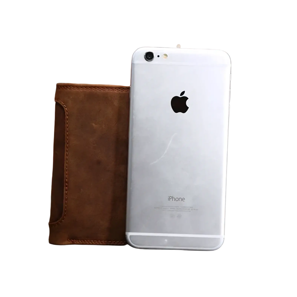 Silver iphone 6 next to a brown genuine leather mens rfid short wallet highlighting material and color