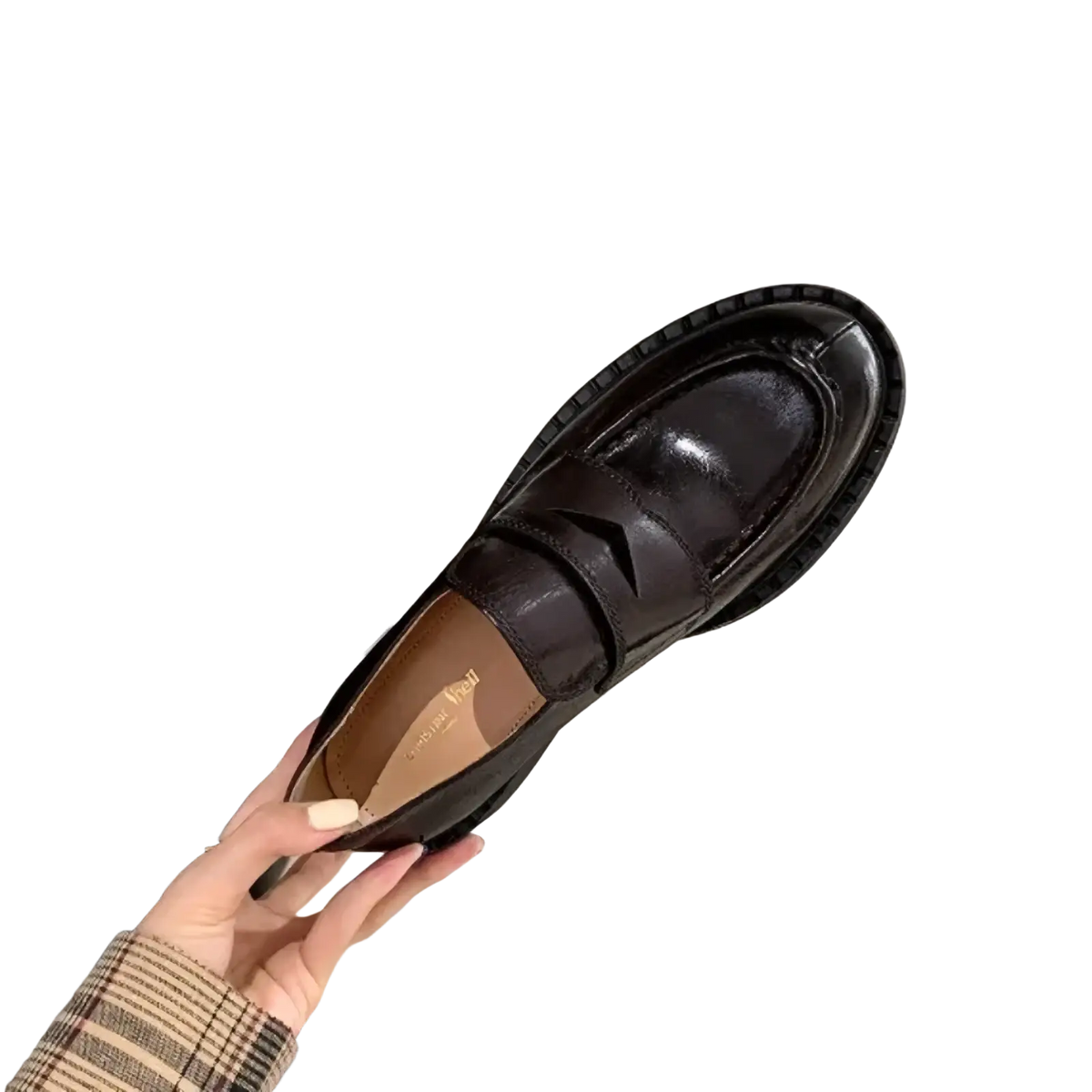 Genuine leather patent loafers in black with a glossy finish and a thick textured sole for durable wear