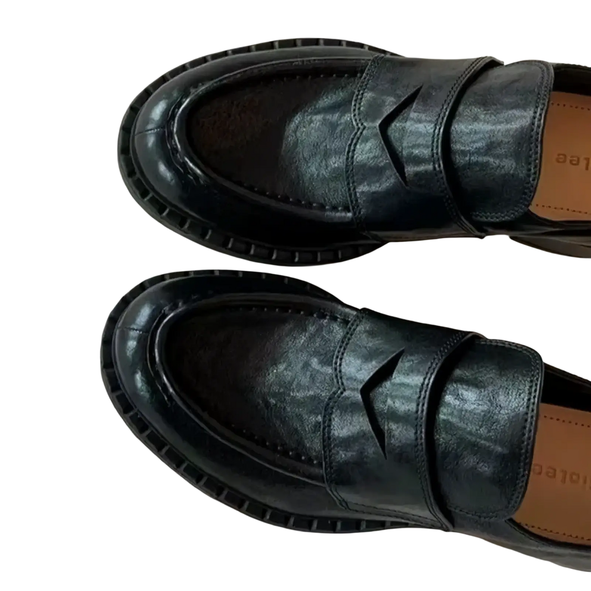 Genuine leather patent loafers in black with a glossy finish and distinctive v-shaped cutout on the vamp