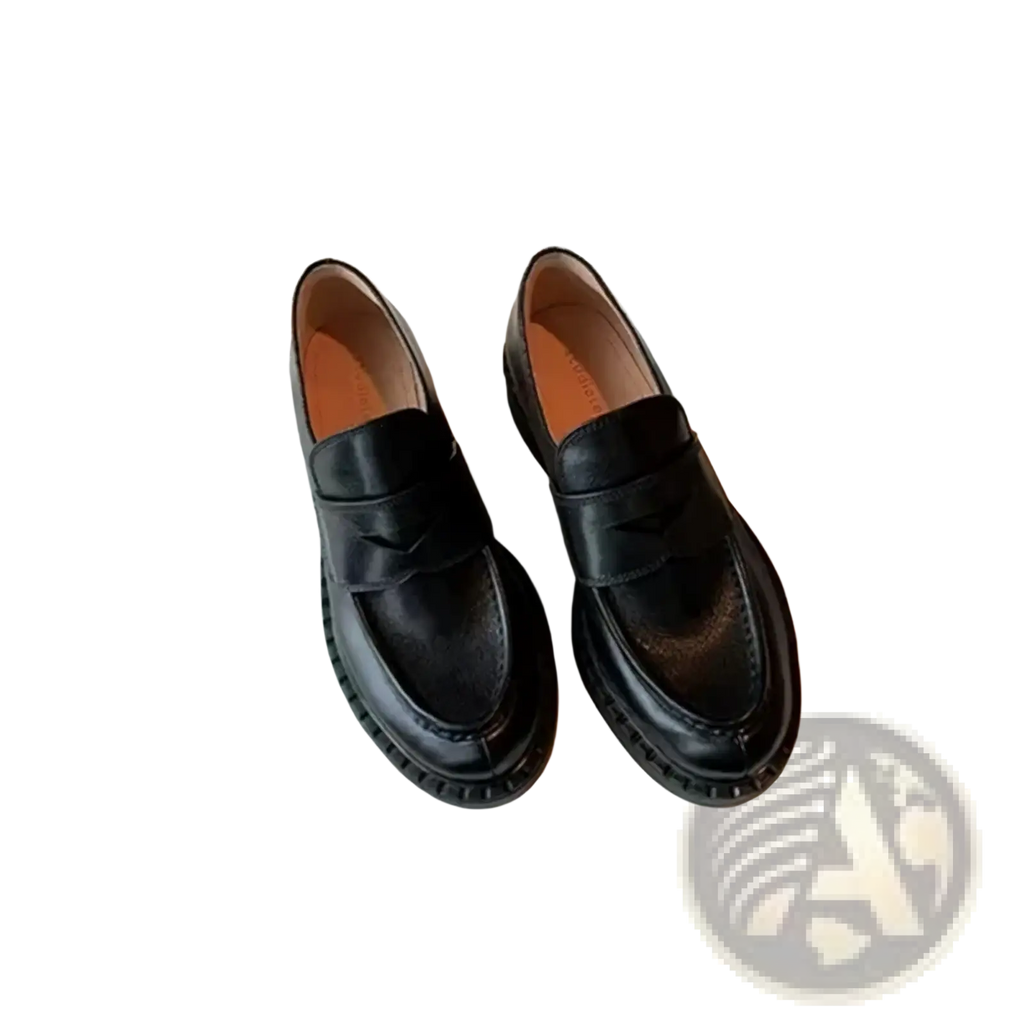 Black genuine leather patent loafers with classic slip-on design and subtle perforations on the toe