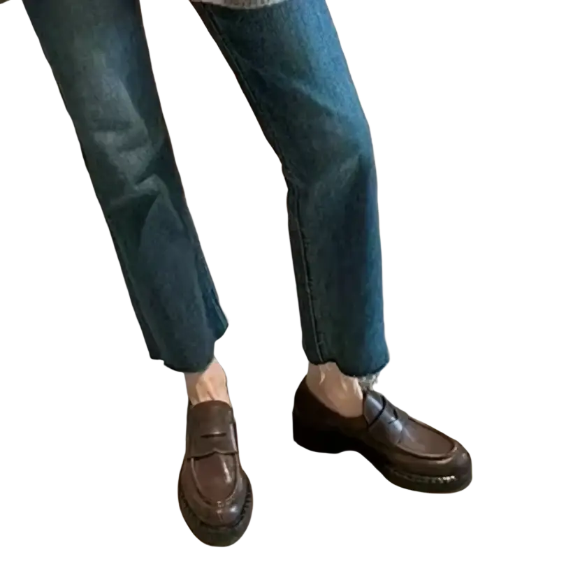Genuine leather patent loafers in brown with classic moccasin design and thick soles for durable wear