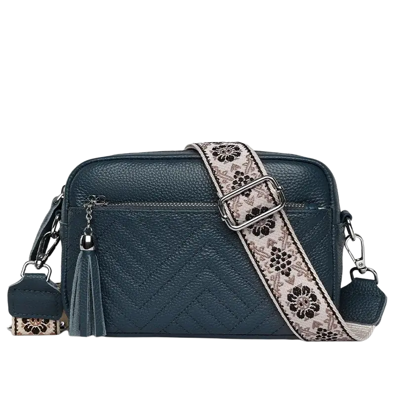 Dark teal genuine leather crossbody bag with quilted chevron pattern and decorative floral-patterned strap