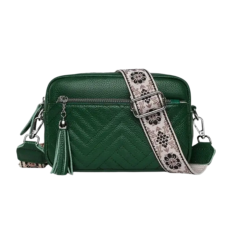 Green genuine leather quilted crossbody bag with floral-patterned strap and matching tassel for leather handbags use