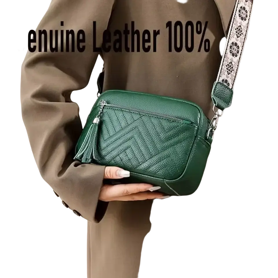 Green genuine leather crossbody bag with quilted chevron pattern and decorative tassel from leather handbags collection