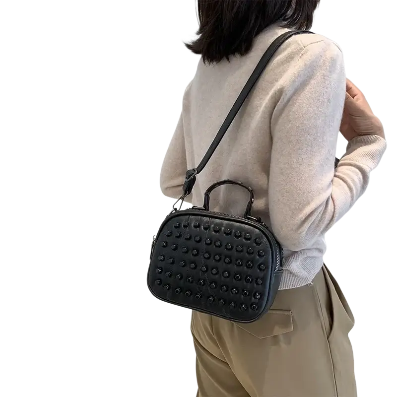 Black studded genuine leather shoulder bag with top handle and phone pocket for everyday use