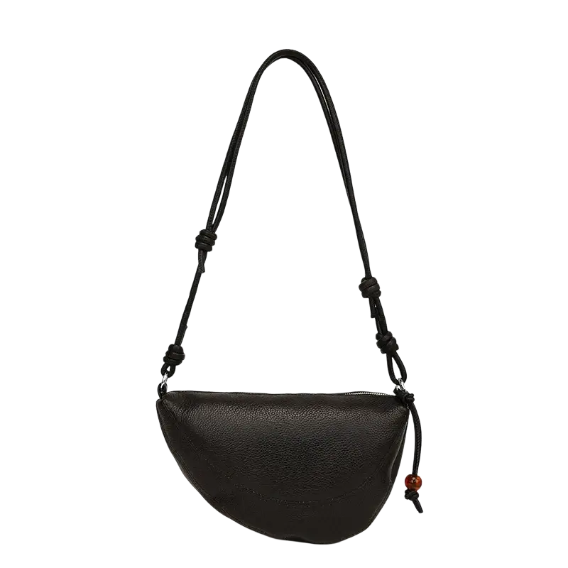 Genuine leather black crescent crossbody shoulder bag with knotted strap and amber bead accent in textured leather