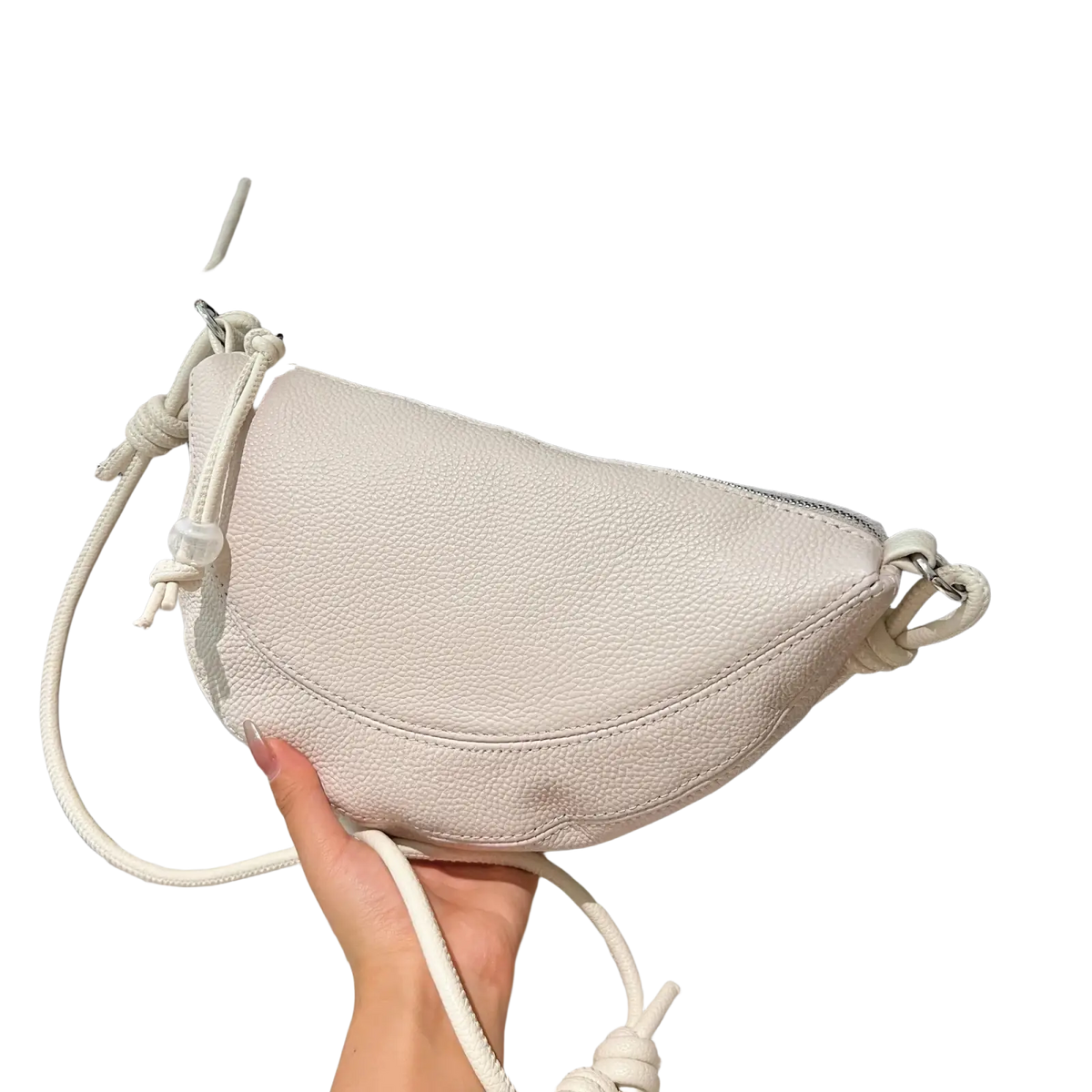 Genuine leather shoulder bag in white with textured surface and braided rope strap ideal for leather handbags use