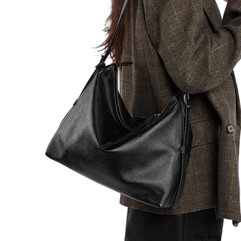 Genuine leather black hobo bag with sleek minimalist design and adjustable shoulder strap for women tote bag use