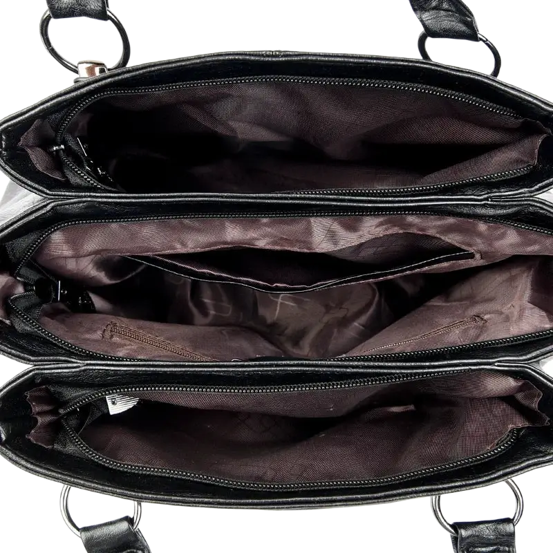 Black genuine leather tote bag with pocket interior featuring three zippered compartments and dark brown satin lining