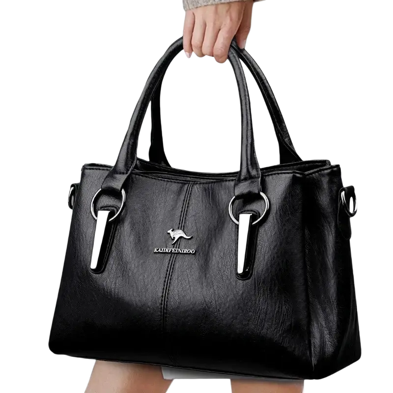 Black genuine leather tote bag with pocket interior, silver kangaroo logo, and metal hardware accents