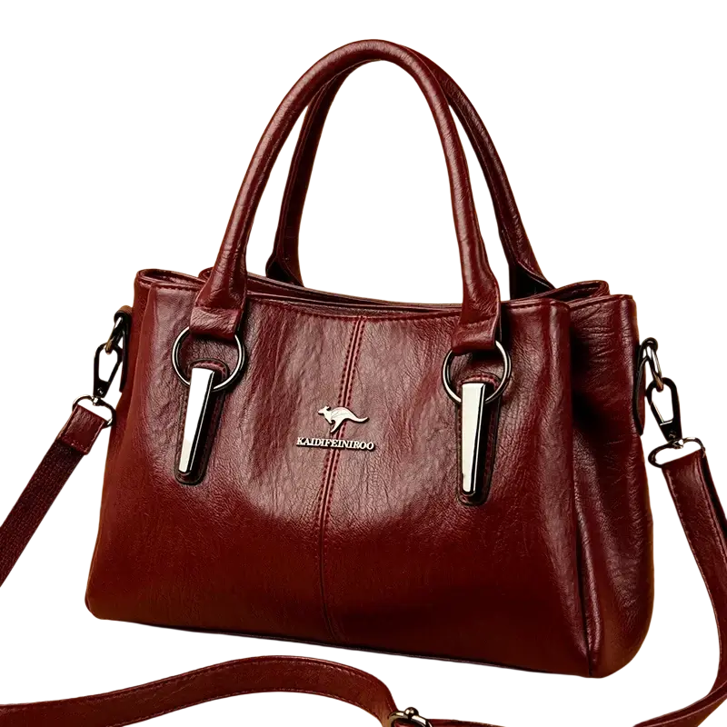 Burgundy genuine leather tote bag with pocket interior and silver-tone kangaroo logo with matching handles