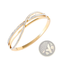 Gold-toned geometric crystal inlaid titanium steel bangle with a sleek intertwined design and sparkling clear crystals