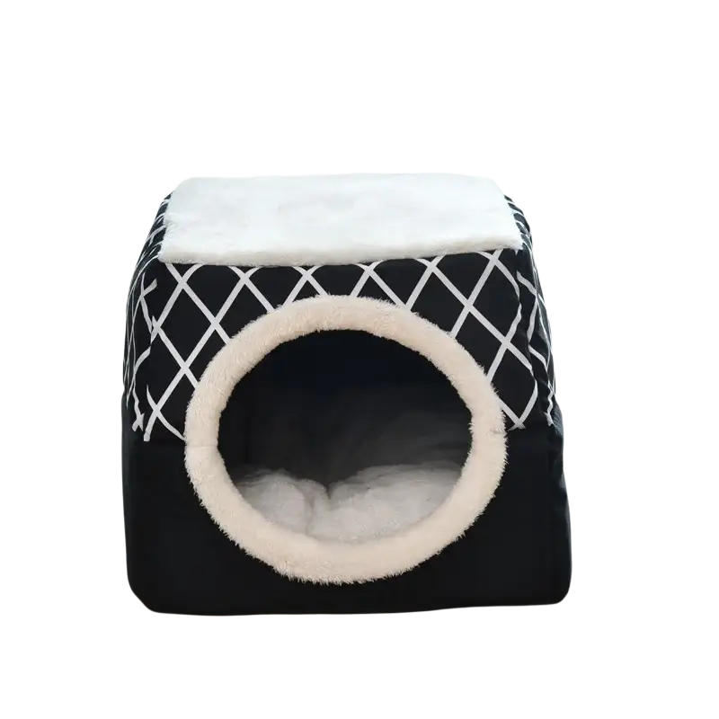 Black and white geometric-patterned enclosed cat bed with plush cream-colored interior lining for cozy rest