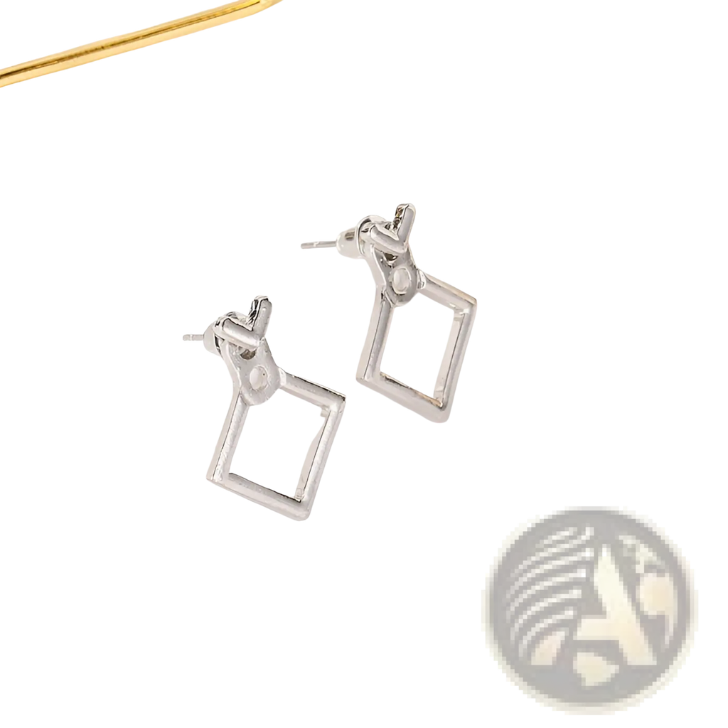 Silver geometric drop earrings with minimalist square frame and twisted knot detail from gold arrow and hollow square studs