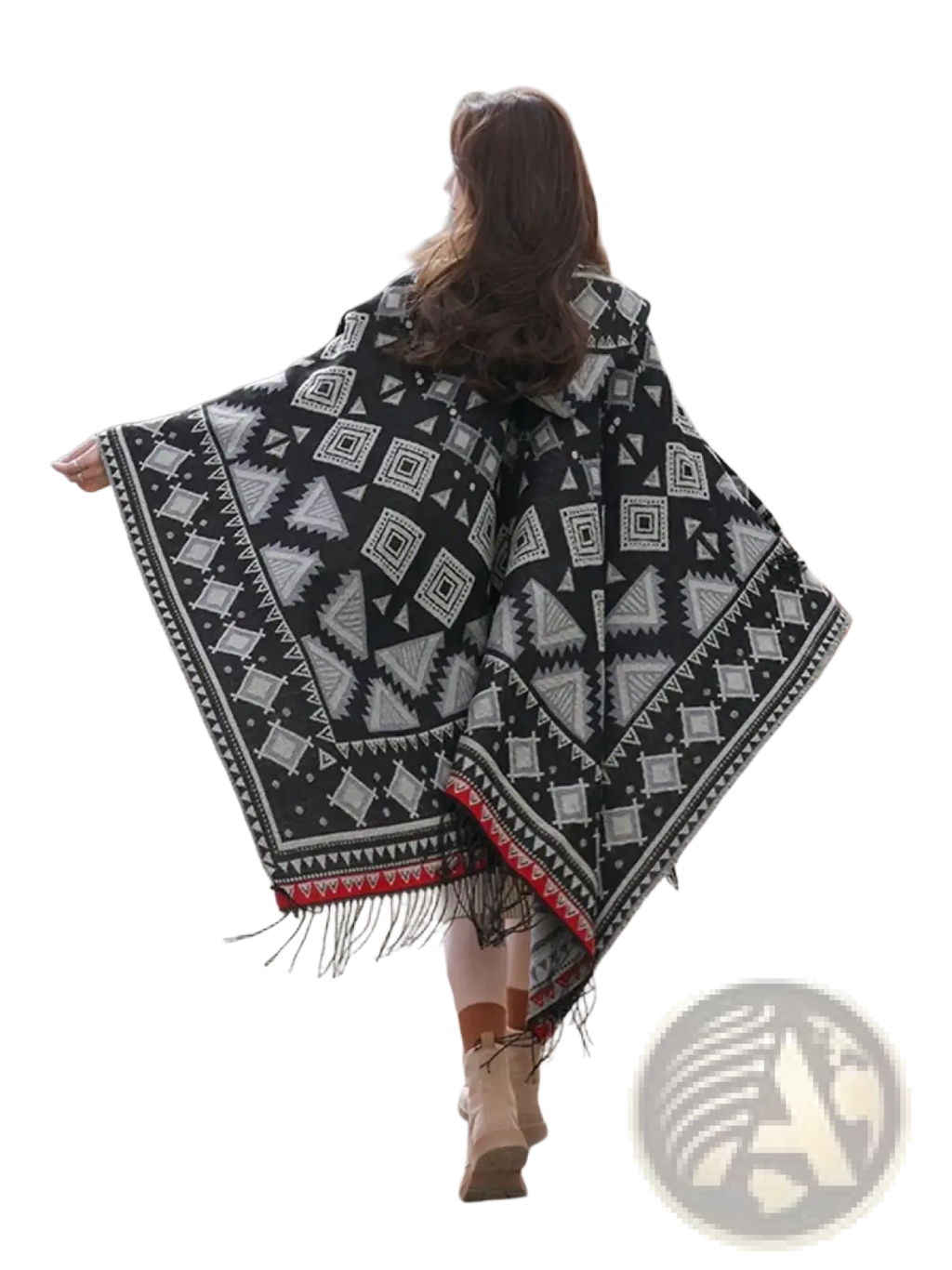Geometric knitted hooded poncho cape with black and white pattern and red-trimmed fringe details