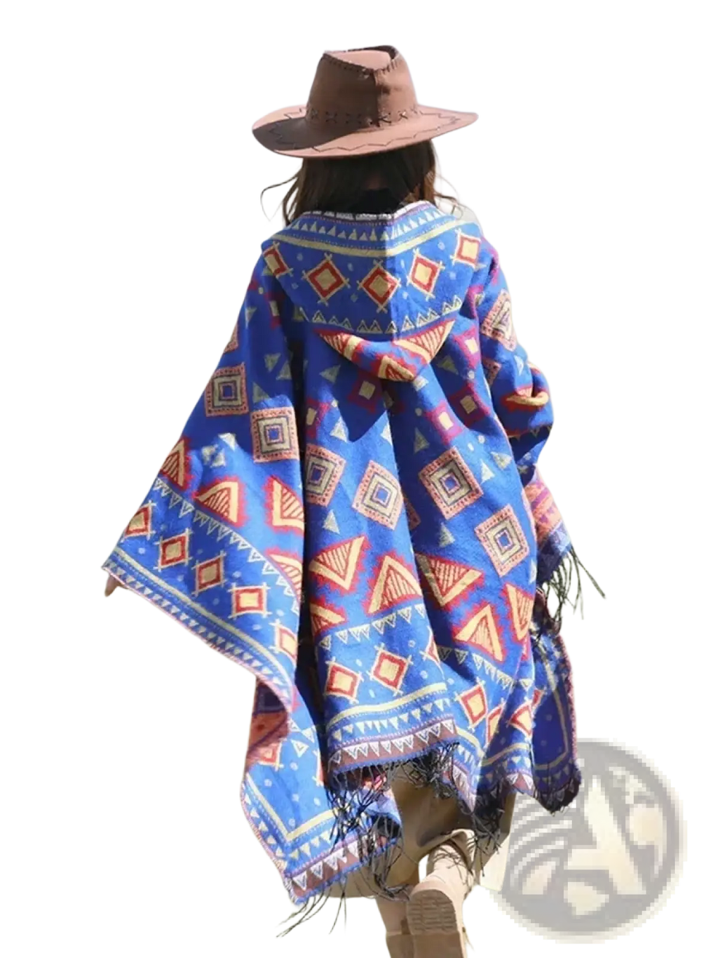 A vibrant blue knitted hooded poncho cape with red orange and white geometric patterns and fringed edges