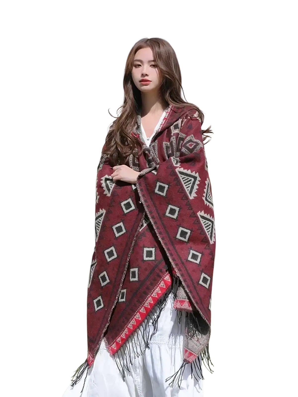A maroon woven geometric knitted hooded poncho cape with fringed edges showcasing its back side