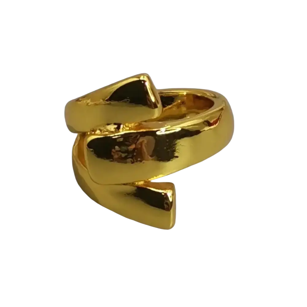 A bold gold geometric open ring with a sculpted intertwined design in silver and gold metal jewelry