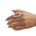 A sleek silver geometric oval open ring for women featuring a bold shape and central cutout design