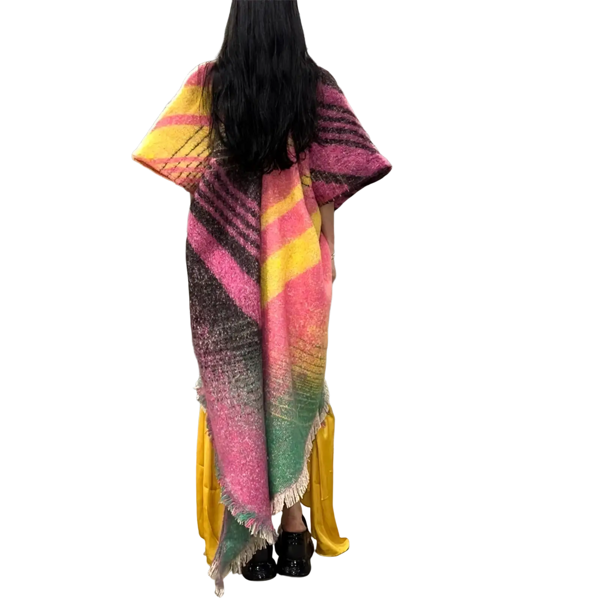 A vibrant oversized winyi poncho coat with bold pink yellow and green diagonal stripes and frayed edges