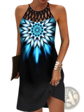 Black halter-neck midi dress with vibrant blue and white geometric mandala print on the front